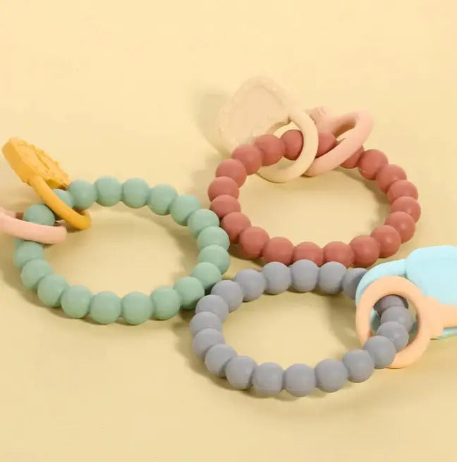 Mordedor de Silicona Tipo Pulsera con Dijes