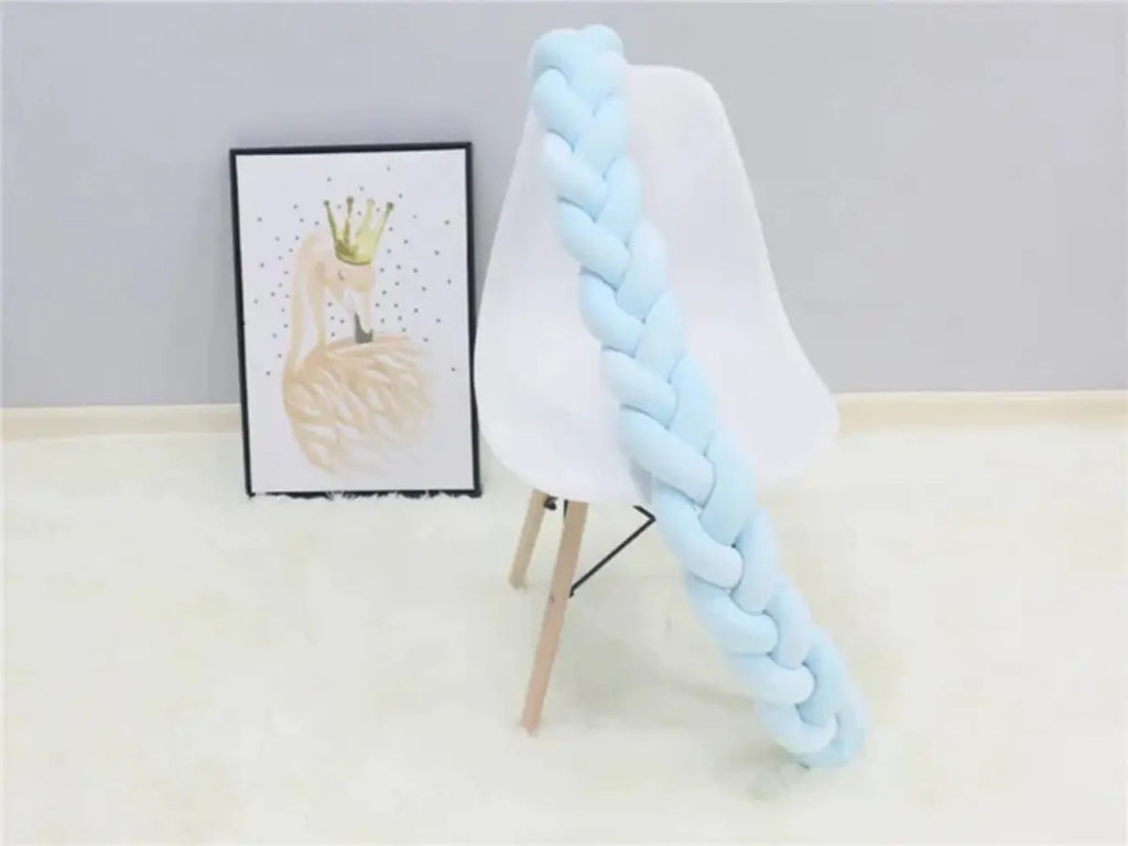 Cojín trenzado celeste, detalle