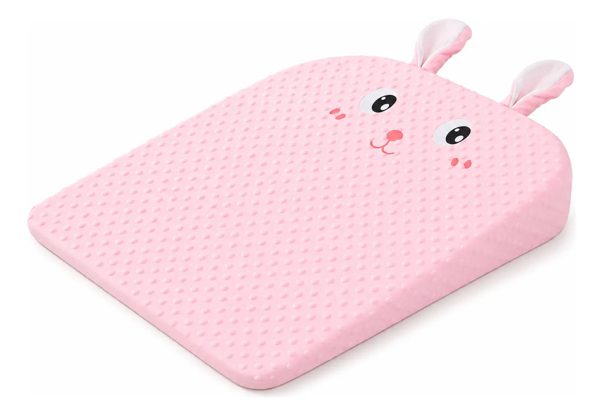 Cojín tipo cuña rosa con diseño de conejo