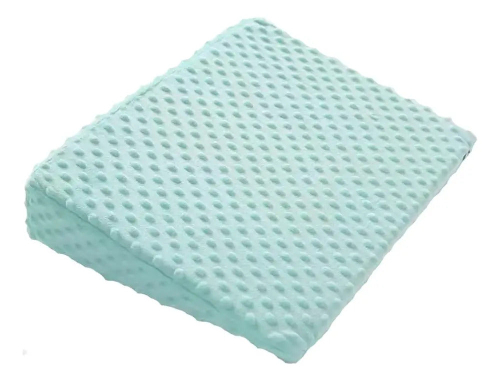 Cojín tipo cuña celeste con funda texturada