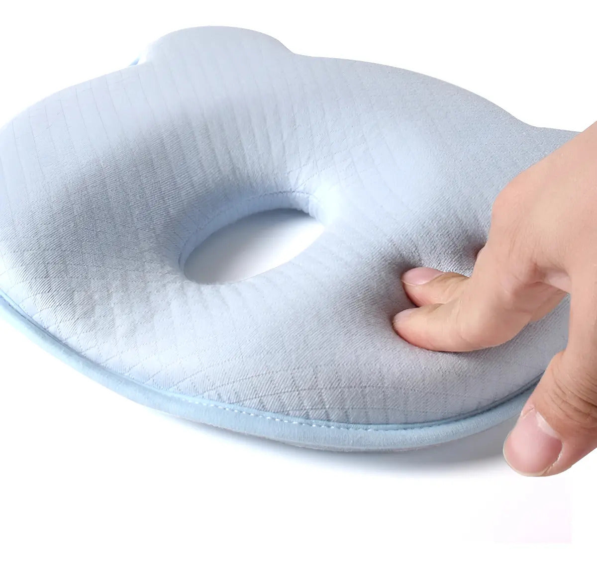 Almohada de espuma celeste con abertura ovalada