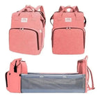 Coral claro · Mochila Pañalera con Mudador Desplegable