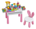 Mesa de construcción rosa con 89 piezas y silla