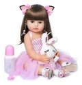 Muñeca Reborn referencia 6-1946 con vestido rosado y accesorios